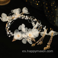 Elegantes accesorios para el cabello nupcial diadema de flores blancas